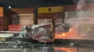 Container carrying a vehicle erupt in flames at PortMiami